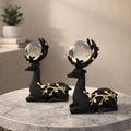 Set Of Two Elegant Reclining Deer Figurine Set with Crystal Orb.